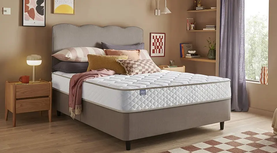 silentnight-memory-1000-pocket-mattress Silentnight Memory 1000 Pocket Mattress sat on a grey bed frame in a stylish bedroom